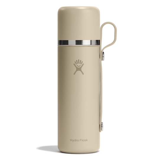 Beige Hydro Flask insulated bottle on a white background
