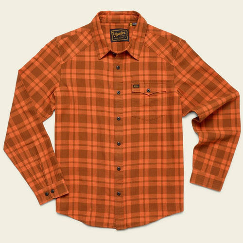 Orange plaid shirt on a beige background