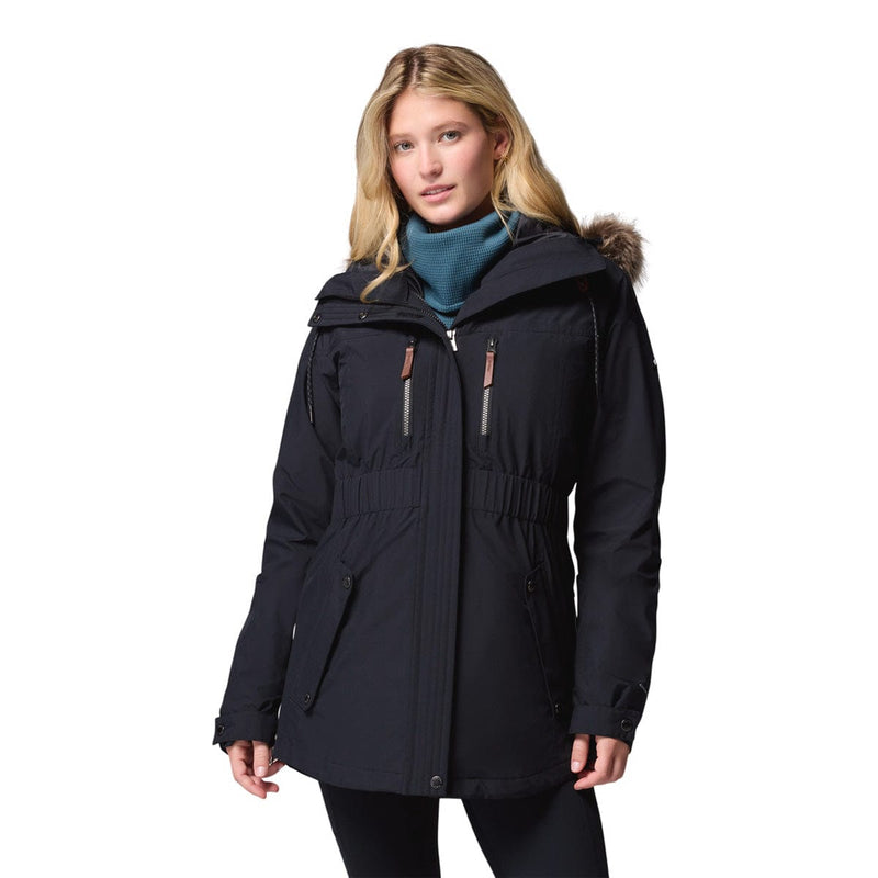 Load image into Gallery viewer, Woman wearing a black coat with fur hood on a white background
