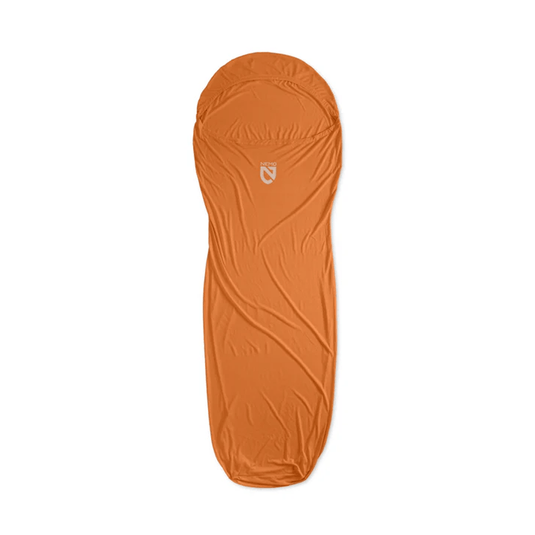 Orange sleeping bag on a white background