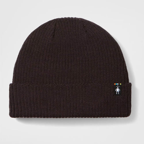 Black knit beanie with a small logo on a light gray background