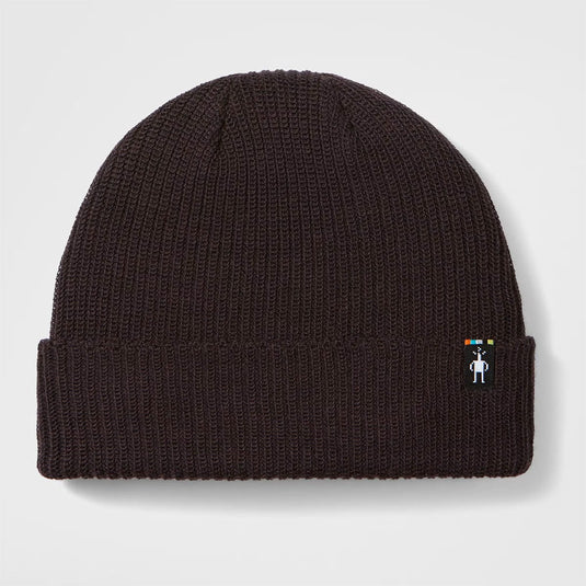 Black knit beanie with a small logo on a light gray background