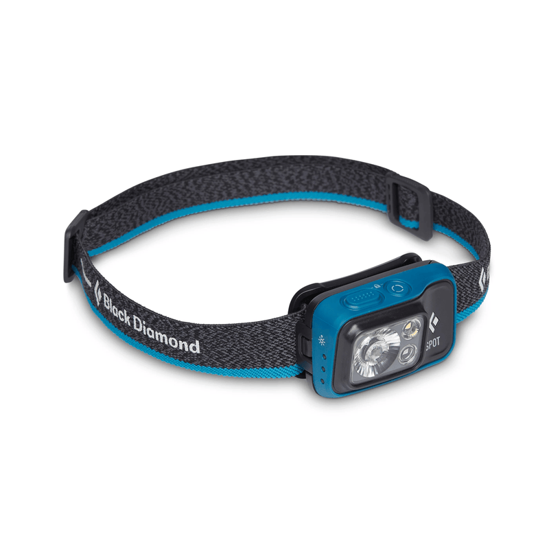 Load image into Gallery viewer, Black Diamond headlamp with blue and gray design on a white background
