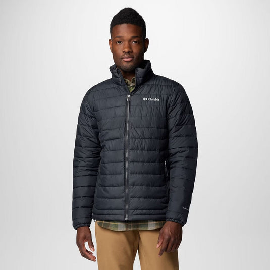 Man wearing a Columbia puffer jacket on a white background