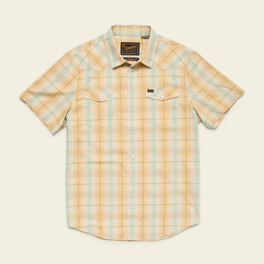 Plaid short-sleeve shirt on a beige background