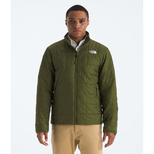 Person wearing a green jacket with The North Face logo on a white background