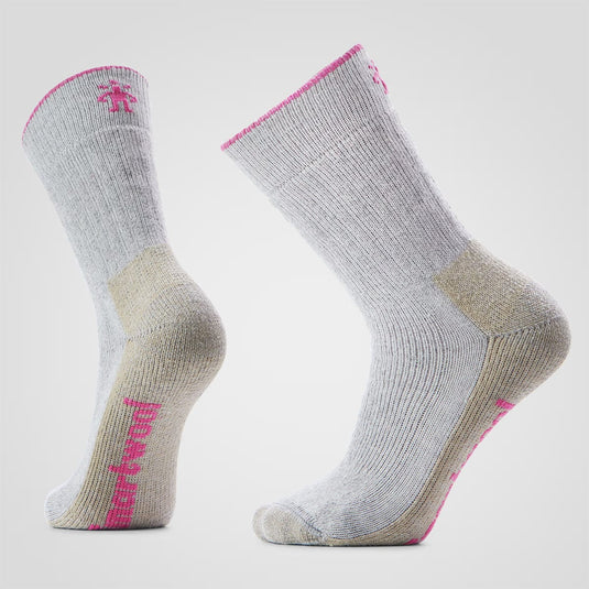 Gray socks with pink accents on a light gray background