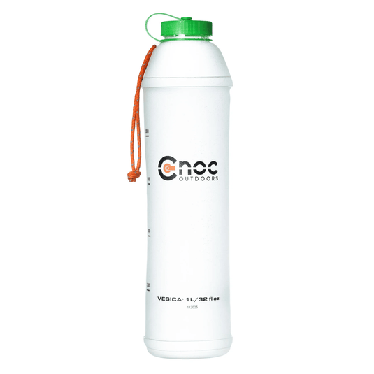 A white plastic water bottle with a green cap and an orange carrying loop, featuring the 'Cnoc Outdoors' logo on the front.