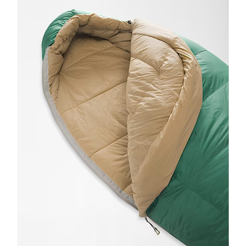 Load image into Gallery viewer, Green and beige sleeping bag on a white background
