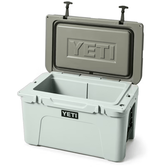 Gray YETI cooler with open lid on a white background