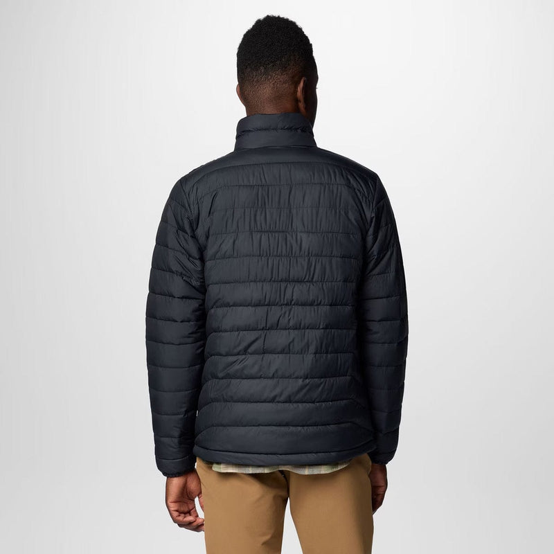 Load image into Gallery viewer, Person wearing a black puffer jacket on a white background
