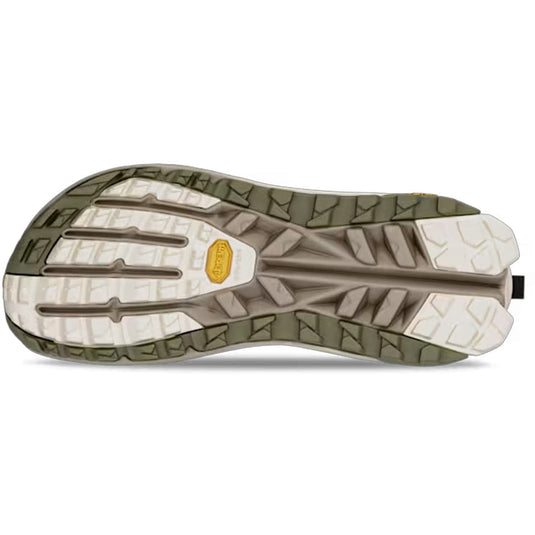 Close-up of a shoe sole with a white and brown design on a white background