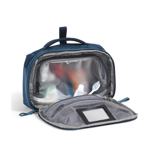 Open blue toiletry bag with mesh pocket on a white background