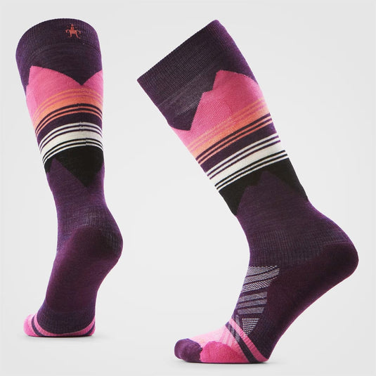 Pair of purple socks with pink and white stripes on a light gray background
