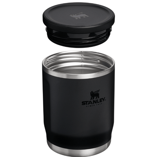 Black Stanley insulated mug with lid on a white background