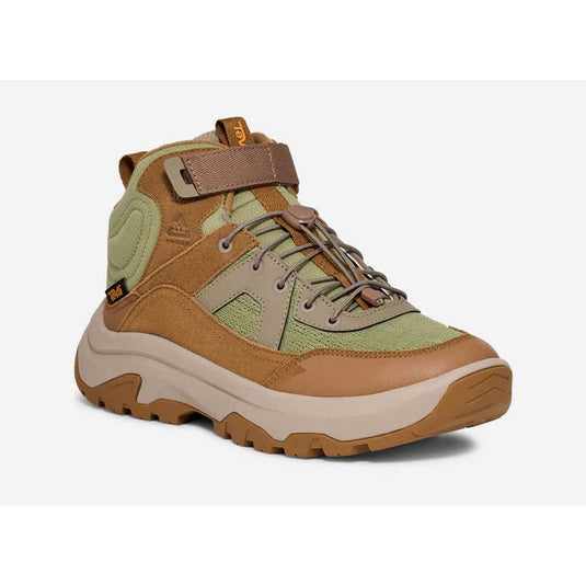 Brown and green hiking boot on a white background