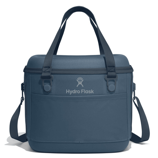 A blue Hydro Flask cooler bag with dual top handles, a detachable shoulder strap, and the Hydro Flask logo printed on the front, set against a plain white background.
