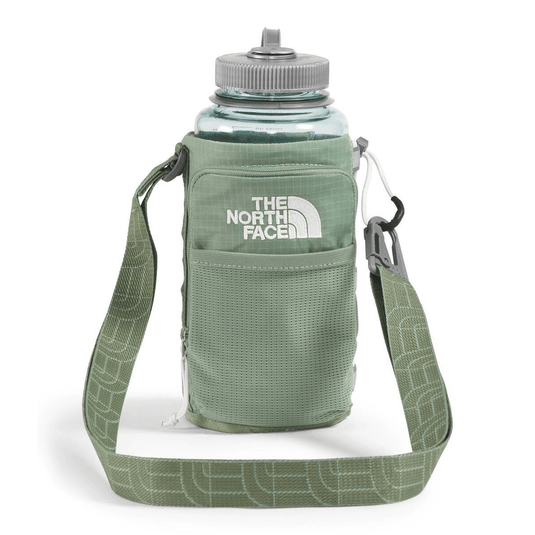 Green water bottle holder with strap featuring The North Face logo on a white background