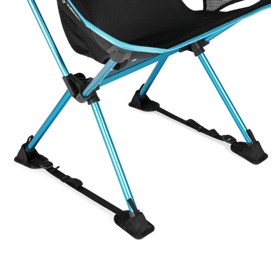Blue camping chair with black footrests on a white background