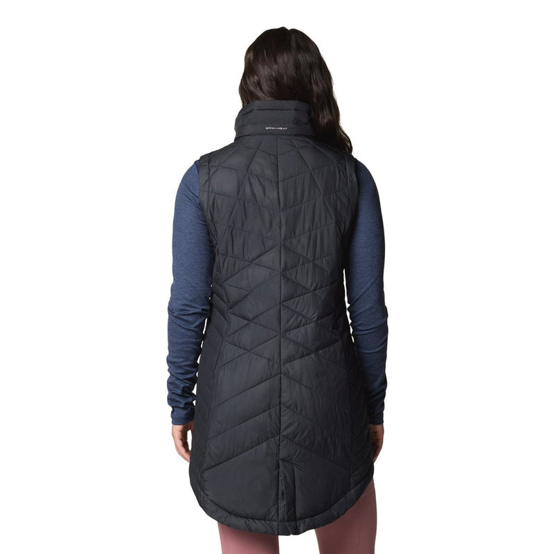 Load image into Gallery viewer, Black quilted vest worn by a person on a white background
