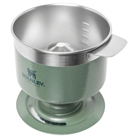 Green and silver coffee brewing device with Stanley logo on a white background