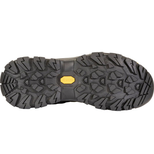 Close-up of a black hiking boot sole with a yellow label on a white background