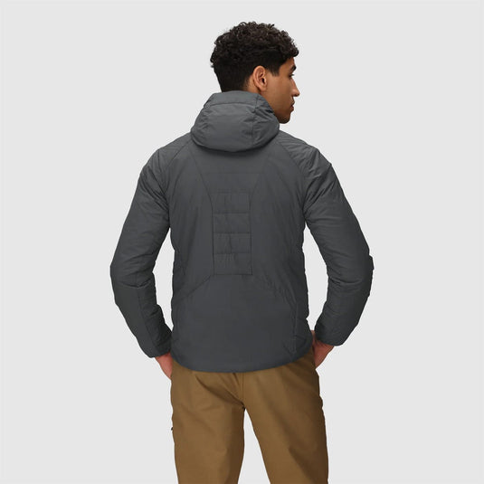 Man wearing a dark gray jacket on a light gray background