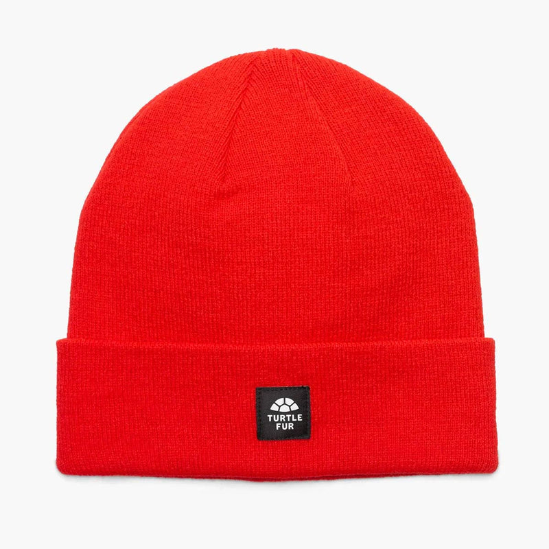 Load image into Gallery viewer, Red beanie with a brand label on a white background
