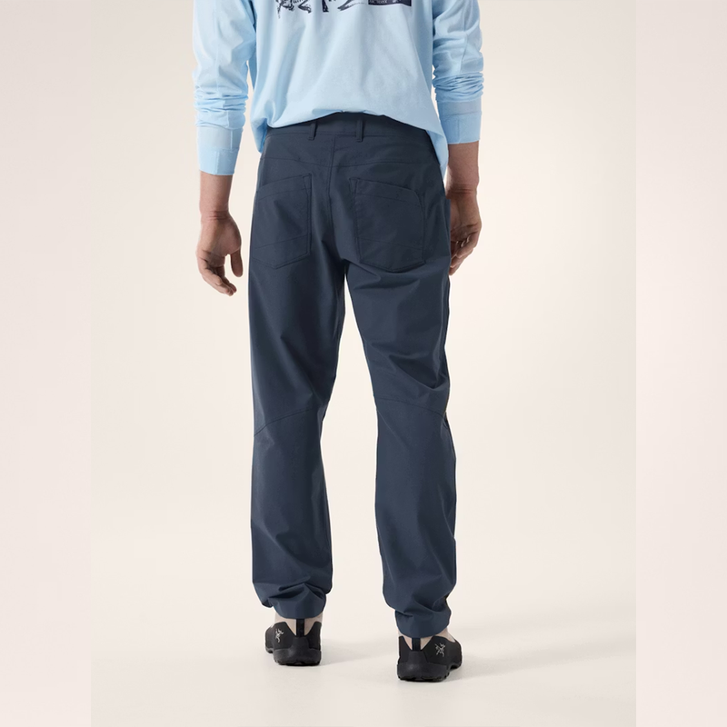 Load image into Gallery viewer, Person wearing navy pants and a light blue long-sleeve shirt on a white background
