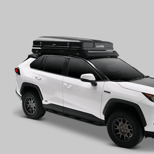 White SUV with a roof rack on a gray background