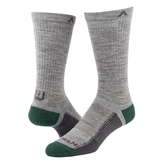 Pair of gray and green socks with brand logo on a white background