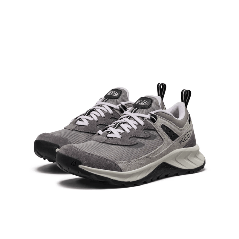 Load image into Gallery viewer, Gray and black sneakers with white soles on a white background
