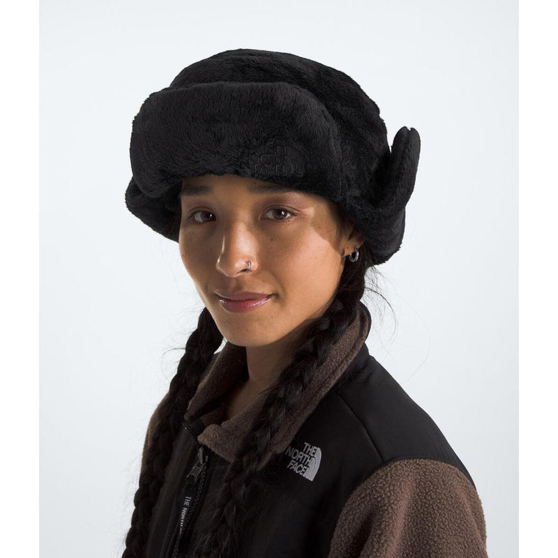 Load image into Gallery viewer, Person wearing a black fur-trimmed hat and brown scarf on a white background
