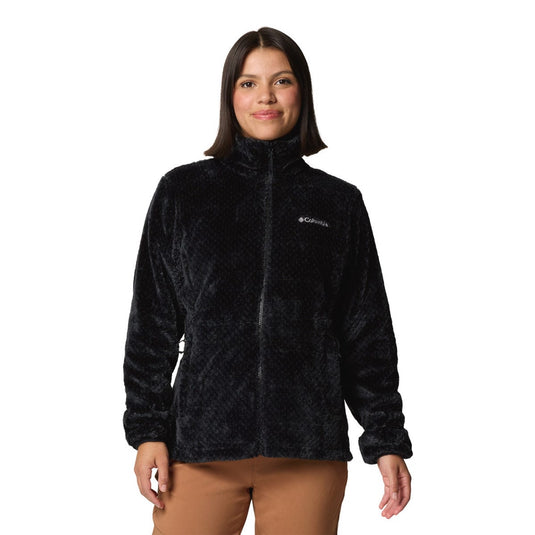 Woman wearing a black fleece jacket with Columbia logo on a white background