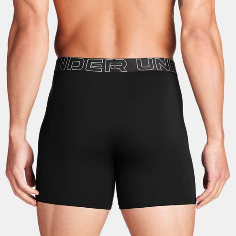 Load image into Gallery viewer, Black Under Armour boxer briefs on a plain background
