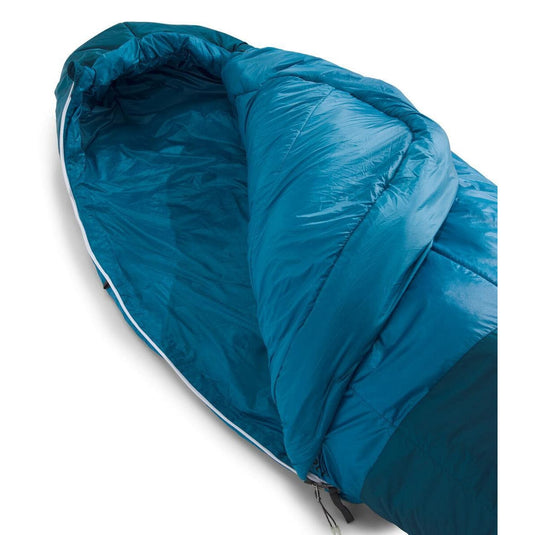 Blue sleeping bag on a white background