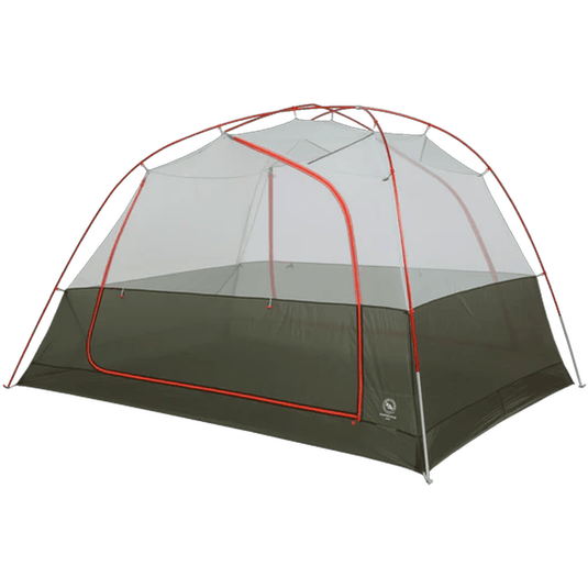 Camping tent with green base and red accents on a white background