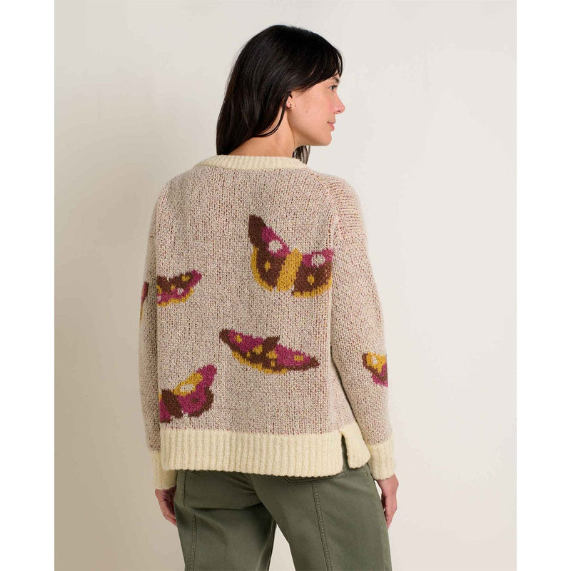 Load image into Gallery viewer, Woman wearing a beige sweater with butterfly patterns on a plain background
