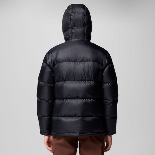 Black puffer jacket on a gray background