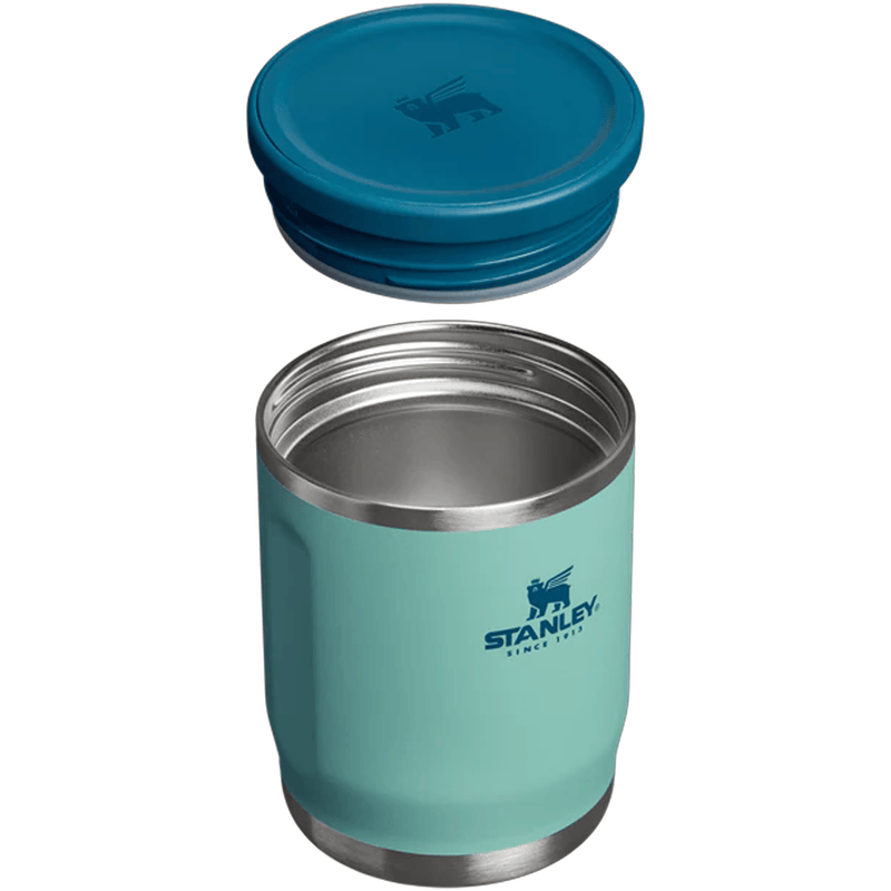 Load image into Gallery viewer, Teal Stanley insulated tumbler with blue lid on a white background
