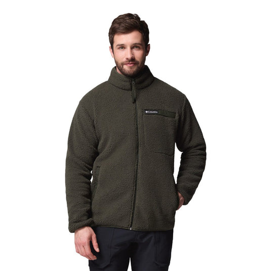 Man wearing a green fleece jacket with a brand logo on a white background