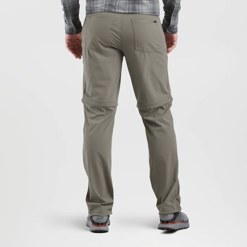 Load image into Gallery viewer, Person wearing beige pants on a white background
