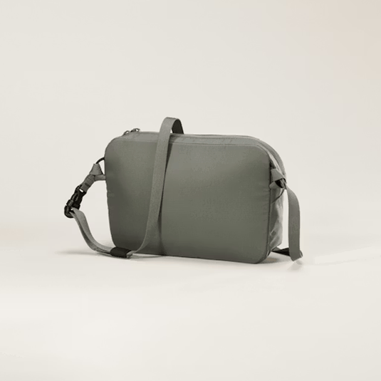 Gray shoulder bag on a light beige background