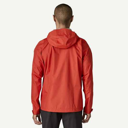 Person wearing a red jacket on a white background
