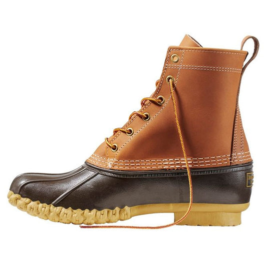 Brown and black boot with yellow laces on a white background