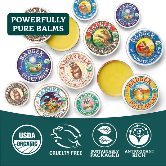 Collection of Badger Balm containers with various scents on a white background