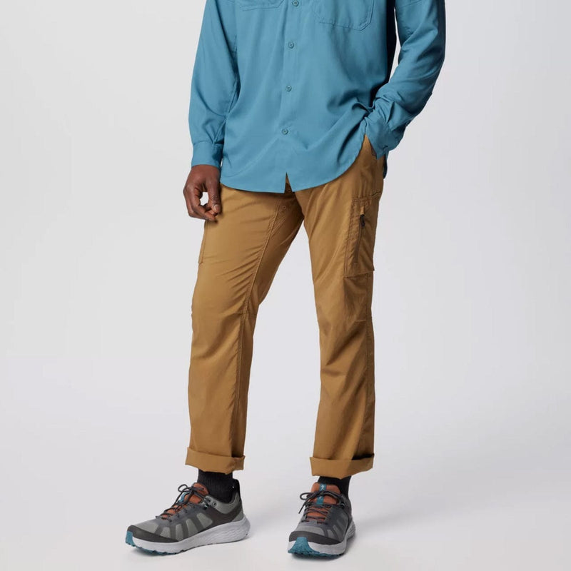 Load image into Gallery viewer, Person wearing a blue shirt, brown pants, and gray shoes on a white background
