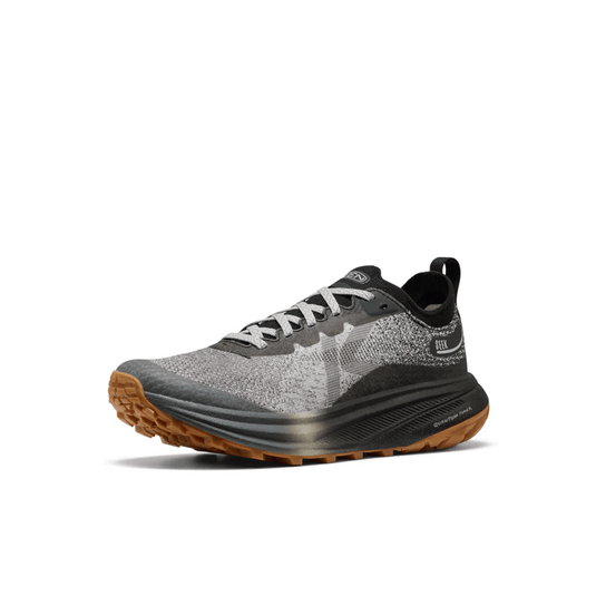 Gray and black athletic shoe with brown sole on a white background