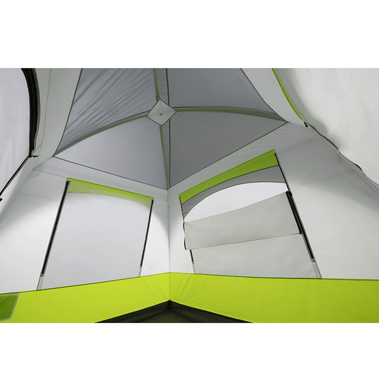 Close-up of a tent interior with green and gray panels