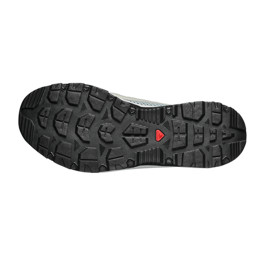 Black sole of a shoe with a red logo on a white background